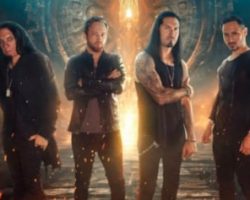INFINITY'S ASHES Feat. QUEENSRŸCHE's CASEY GRILLO And Guitar Virtuoso ANGEL VIVALDI: 'To Live In What Exists' Single Released