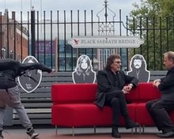 Watch: TONY IOMMI Remains Unruffled By Gatecrasher During BBC TV Interview