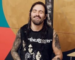 Watch: Ex-SLIPKNOT Drummer JAY WEINBERG Takes Part In In-Store Performance And Signing At U.K. Tattoo Shop