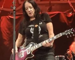 Watch: GIRLSCHOOL's KIM MCAULIFFE Struggles To Stay On Her Feet During Örebro, Sweden Concert