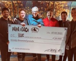 PAPA ROACH Presents £20,000 Check To 'Campaign Against Living Miserably' During U.K. Arena Tour