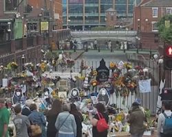 Watch: Fans Turn Birmingham's BLACK SABBATH Bench Into Makeshift Memorial For OZZY OSBOURNE